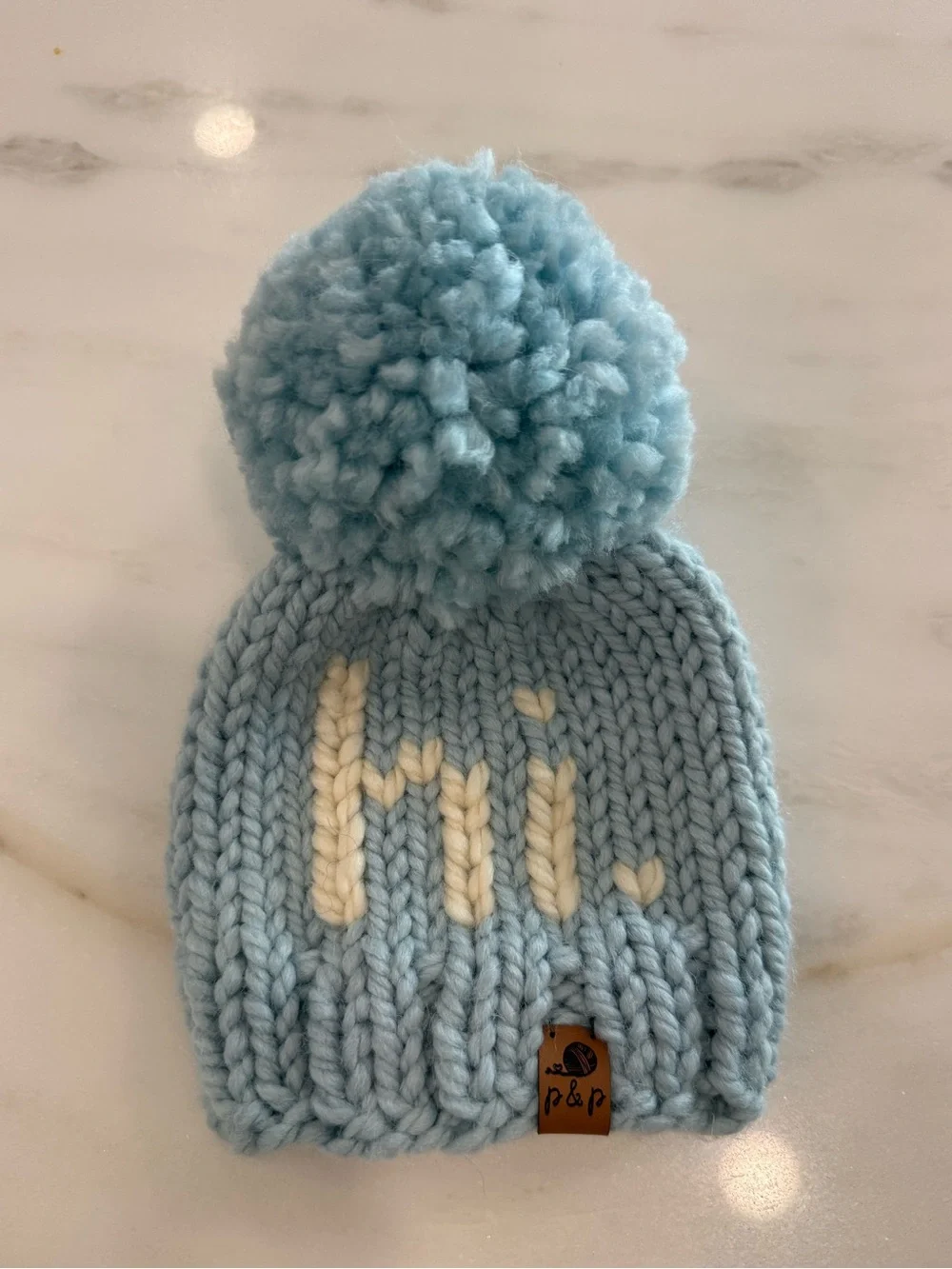 Pine and Poppy newborn Light Blue Knit Pom “Hi” Beanie